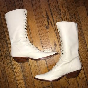 White leather lace-up cowboy boots